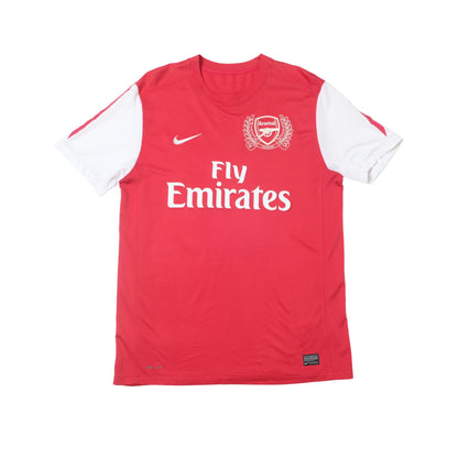 Red sleeveless sports jersey with 'Fly Emirates' text on a white background