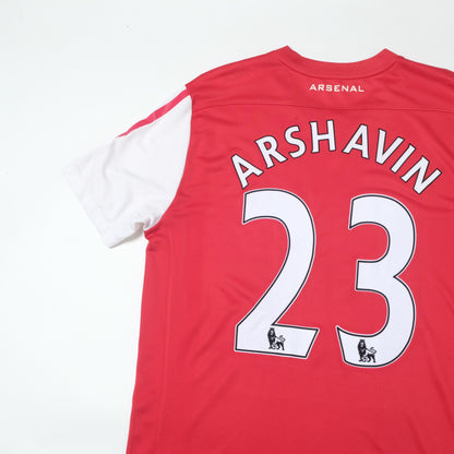 Red Arsenal football jersey with 'Arshavin' and number '23' on a white background