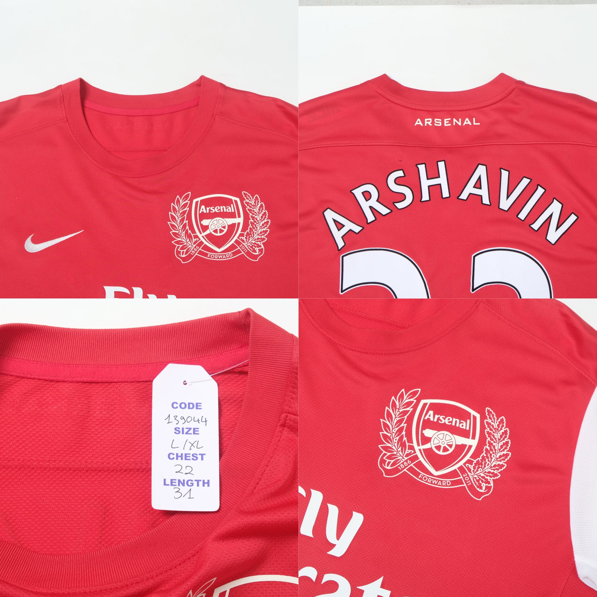 Red Arsenal football jersey with Arshavin's name and number on a white background